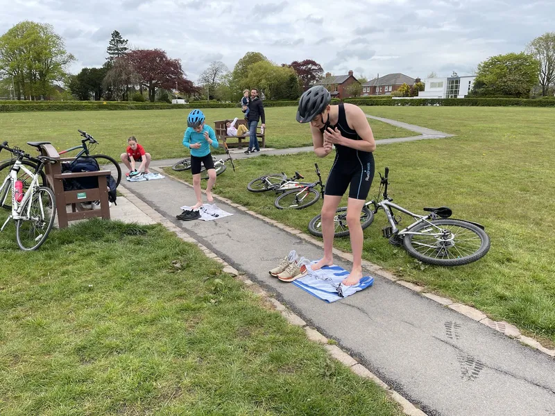 Juniors practising transition between bike and run